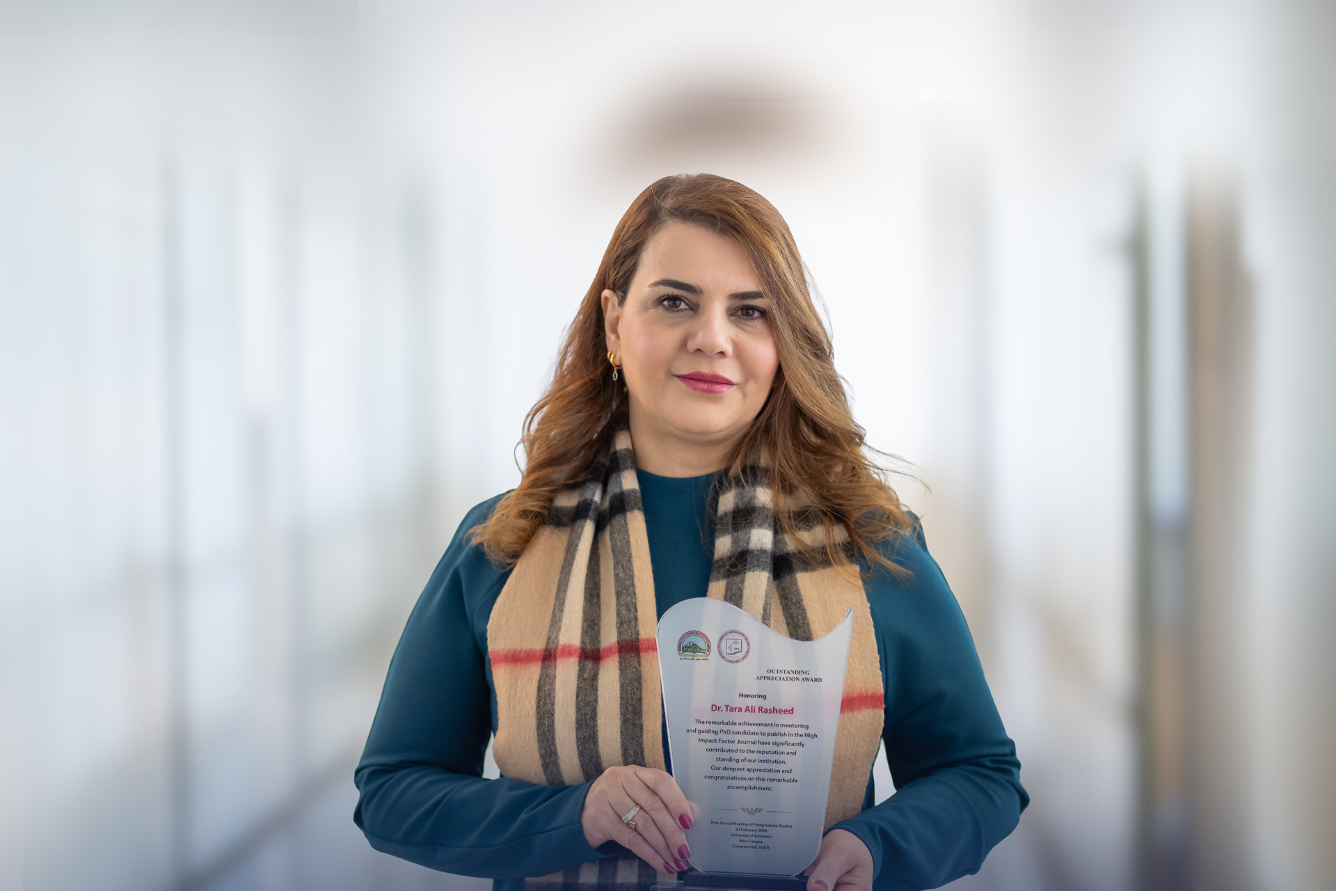 Dr. Tara Ali Rasheed Honored with Outstanding Appreciation Award