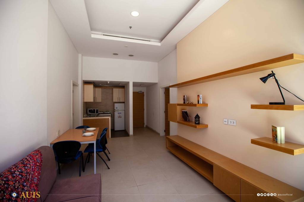 A standard living room setup in the dormitory.